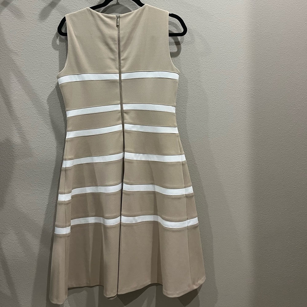 Tan dress with white stripe worn once for a Cotillion event
